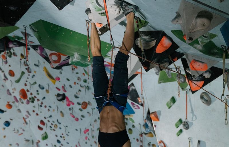 A person holding a challenging balance pose, demonstrating core strength.